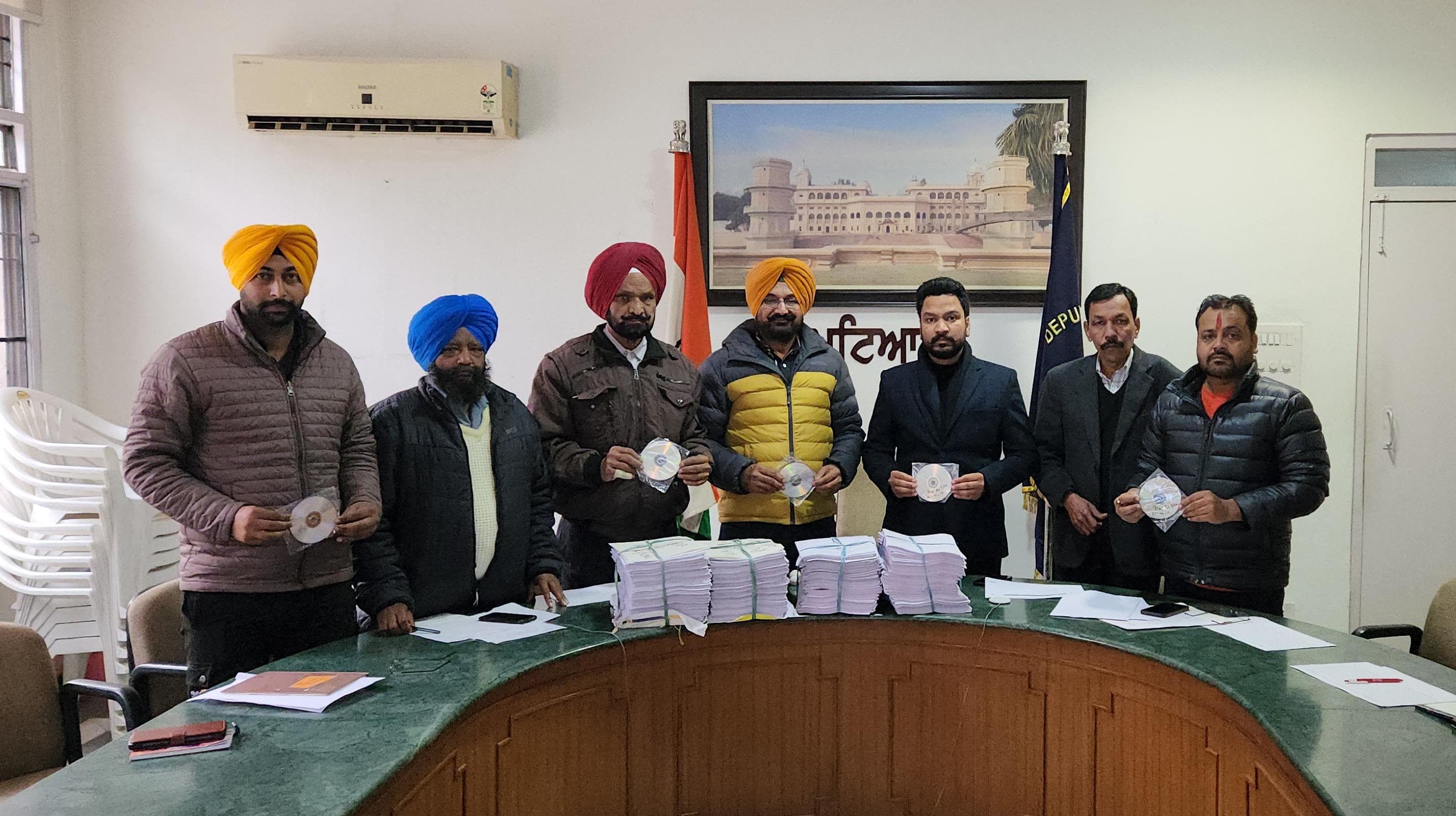 The Assistant Commissioner handed over the voter lists and CDs to the representatives of the political parties